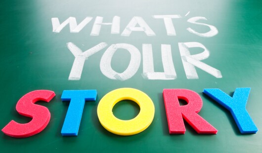 What is your story? Colorful words on blackboard.