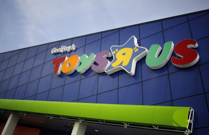 Signage is displayed outside a Toys R Us Inc. retail store in Louisville, Kentucky, U.S., on Monday, Sept. 18, 2017. Toys R Us Inc., which has struggled to lift its fortunes since a buyout loaded the retailer with debt more than a decade ago, is preparing a bankruptcy filing as soon as today, according to people familiar with the situation. Photographer: Luke Sharrett/Bloomberg via Getty Images