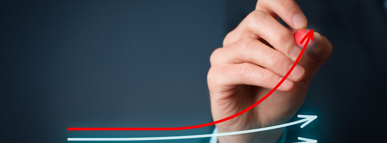 Benchmarking and market leader concept. Manager (businessman, coach, leadership) draw graph with three lines, one of them represent the best company in competition.