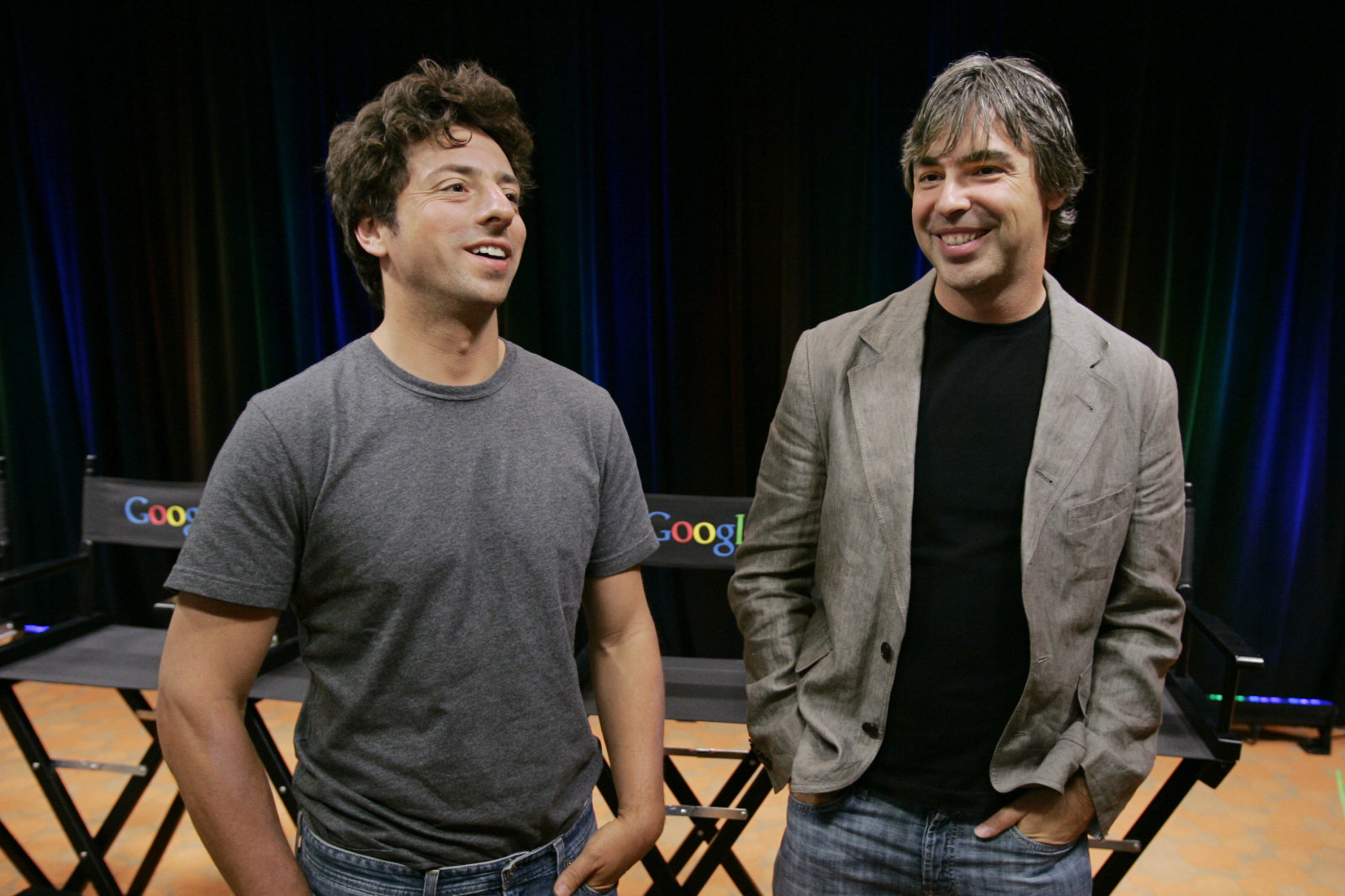 FILE - In this Sept. 2, 2008 file photo, Google co-founders Sergey Brin, left, and Larry Page talk during a new conference at Google Inc. headquarters in Mountain View, Calif. Brin and Page have always said they put their principles before profit, even to the point of using their control of the company to take a stand. (AP Photo/Paul Sakuma, file)